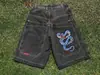 Pantalones cortos de mezclilla estampados de hip-hop europeos y americanos de fábrica directa transfronteriza para hombre, marca de moda americana, casual, pierna ancha
