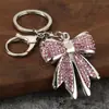 Anel de chaveiro de liga de zinco em formato de laço com strass, pingente de chave de metal, acessório DIY para chaveiro de carro e bolsa