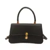 Bolso de mano de lujo ligero estilo coreano al por mayor para mujer, nuevo modelo de verano 2026, bolso de hombro con cierre de color liso, bolso cruzado para el día a día