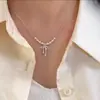 Colar Pingente de Pérolas Estilo Ballet com Renda Vazada e Laço para Mulheres, Colar de Design Exquisito Acessível de Luxo de Ponta