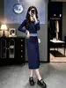 Conjunto de punto de moda estilo universitario coreano para mujer, nuevo modelo otoño e invierno 2026, top y falda, conjunto de dos piezas a la moda