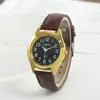 Transmisión en vivo de microempresa nuevo reloj de pulsera imitación oro moda mujer hombre cuarzo transfronterizo reloj de pareja productos genuinos