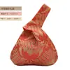 Venta al por mayor del fabricante Empaques de regalo grandes y pequeños Bolsas de regalo de almacenamiento Bolsas de mano con asa única estilo chino para recuerdos