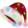 Gorro navideño de peluche con luz LED brillante para adultos y niños, con adornos navideños luminosos.