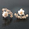 Pendientes de flor de margarita de moda coreana pendientes de crisantemo de venta caliente transfronteriza pendientes de moda de dos usos con colgante trasero