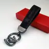 Colgante de Llavero de Cuero Gamuzado de Gama Alta para Coche Llavero con Logo de Coche Decoración de Llavero Colgante de Cintura de Metal Venta al por Mayor