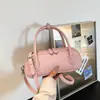 Bolsa de bowling manual de nicho transfronteiriça francesa para mulheres, novo estilo, moderna, super quente, versátil, para o dia a dia, de ombro único, transversal, tendência