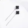 Pendientes de Borla Lisa de Trébol de Cuatro Hojas Mismo Estilo E-Commerce Xiaohongshu Diseño de Nicho de Gama Alta Pendientes Simples Versátiles