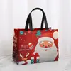Bolsas de regalo personalizadas, bolsas de tote no tejidas con tema navideño y impresión de logo, al por mayor, para regalos de Nochebuena y empaque de dulces navideños