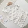2026 Nuevo Estilo Conjunto de Pijama para Bebé Verano Lunares Elegante Ropa de Casa de Dos Piezas para Niñas Ropa de Aire Acondicionado para Niños Pequeños