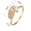 Ebay suministro Joyería europea y americana moda dinámica anillo forma de alas cobre chapado en oro micro incrustado circonio fábrica en stock