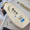 Ouya Xiang Tao arroz água shampoo gel de banho condicionador máscara de cabelo Pacote da família para homens e mulheres uma geração de cabelo atacado 1644