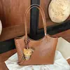 Bolso tote de hombro único de alta gama transfronterizo para mujer, nuevo patrón tejido de moda, gran capacidad, para ir al trabajo, bolso tipo cesta para debajo del brazo