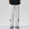 Calça Casual Unissex de Três Listras Estilo Novo para Venda por Atacado, Esportiva Casual, Jovem, Tendência da Moda, Calça de Corte Reto