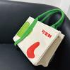 Bolsa de lona Eva complexa tridimensional personalizada com logotipo impresso elegante, bolsa de lona para promoção corporativa da associação universitária, personalização