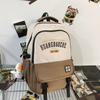 Mochila Japonesa Masculina Simples Versátil Grande Capacidade Mochila de Viagem para Mulheres Alunos do Ensino Fundamental Alunos do Ensino Médio Alunos Universitários Mochila Escolar da Moda