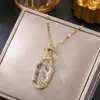 Cadena de clavícula de acero de titanio estilo retro nacional moda candado de paz de jade colgante de izaje todo partido temperamento accesorios de estilo chino de alta calidad