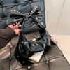 Estilo americano Hot Girl Sweet Cool Style Bow Design Bolsa de ombro com axila Outono e inverno Nova bolsa de mão estilo máquina de rebite