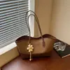 Bolsa de axila feminina de alta qualidade transfronteiriça 2026 nova moda outono popular bolsa de trabalho para o dia a dia bolsa tote versátil
