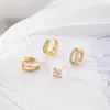 Brincos de Clipe Argola Dupla Vazada Minimalista Transfronteiriços Europeus e Americanos com Trevo de Quatro Folhas Cravejado de Diamantes, Design Elegante e Compacto