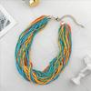 Collar de cuentas de arroz cortas multicapa de venta caliente transfronterizas, collar de cuentas de moda europea y americana que combina con todo, cadena de clavícula hecha a mano