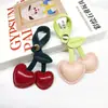 En Stock Versátil Cuero de Cereza Hecho a Mano Amuletos para Bolsos y Accesorios de Vestir al por Mayor