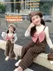 Conjunto Estiloso Soltinho Estilo Chanel para Meninas, Outono e Primavera, Versão Coreana de Duas Peças Xadrez Novo para Bebê Menina 2025 Início do Outono