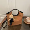 Bolsos de Gamuza de Venta Caliente de Principios de Primavera para Mujer 2026 Moda Nuevo Bolso Cruzado Versátil Bolso de Mano Bolso Cubo Bolso Tote Pequeño para Mujer