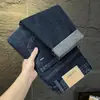 Jeans de Alta Qualidade Outono Masculino Calças Casuais Retas Largas Primavera e Outono 2026 Novo Estilo Juventude Versátil Elástico Calças Longas