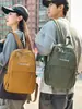 Mochila de Viagem para Estudantes de Lazer de Comércio Exterior Transfronteiriço 2025 Nova Mochila de Viagem para Casais de Nylon Versátil
