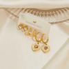 Aretes de acero de titanio chapados en oro para mujer, aretes de alta gama que no se desvanecen, aretes asimétricos vintage, aretes transfronterizos, aretes de estrellas