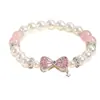 Pulsera de Perlas de Cristal Rosa con Lazo y Cuentas para Mujer, Cuentas de Mariposa Rosa Melocotón, Joyería de Pulsera de Cristal de Lujo Ligero Princesa Fugitiva