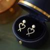 Pendientes de perla de amor para mujer, de alta gama, ligeros y lujosos, 2023, nuevos y de moda, con diseño de nicho de fragancia, estilo Hong Kong elegante.