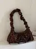 Otoño 2026 Nuevo Bolso de Viaje de Nicho de Alto Valor Estampado de Leopardo con Lazo Bolso de Hombro Elegante Bolso de Axila