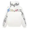 Sudadera con capucha bordada de notas musicales coloridas estilo retro americano para hombres y mujeres, corte holgado, marca de moda, sudadera casual para parejas