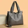 Bolso Tote Versátil de Moda Transfronterizo 2025 Nuevo Bolso de Hombro para Mujer Piel Suave de PU Retro Portátil para Viajes y Uso Diario Bolso de Axila
