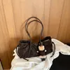 Bolso de hombro cruzado 2026 Otoño Nuevo Popular Estampado de Leopardo Casual Retro Versátil Simple Moderno Elegante Debajo del Brazo