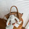 Bolso de Mano Tipo Cubo de Alta Gama Estilo Comercio Exterior para Mujer, Nuevo Bolso de Hombro Casual Vintage Invierno 2026, Bolso Cruzado de Nicho
