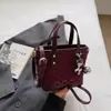 Bolso Cubo de Mano Estilo Coreano para Mujer 202 Verano Nuevo Estilo Simple Casual Estilo Occidental Bolso de Mujer de Aspecto Elevado Moda Bolso Cruzado