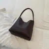 Bolsa de axila Shuai Mijia para mujer 2026 Otoño Nuevo Retro Nicho Textura tejida Bolso de hombro único Bolso cubo para el trabajo