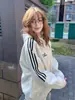 Moletom Cardigan com Capuz Três Listras High Street Americano para Mulheres no Outono e Inverno Estilo Esportivo Solto Jaqueta com Zíper Top Ins