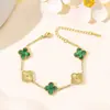 Pulsera de acero de titanio chapada en vacío 18k, diseño de nicho, trébol de cuatro hojas, floral, pulsera de moda de alta gama