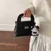 Bolso de mano moderno con cierre de rombo para mujer 2026, nuevo bolso de hombro con cadena, bolso cruzado sencillo y elegante de nicho.