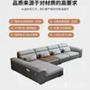 Sofá de cuero gris oscuro de lujo ligero estilo italiano con ribete naranja, respaldo segmentado y chaise longue para sala de estar del hogar