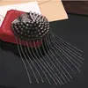 Corea del Sur personalidad remache tridimensional europeo y americano discoteca vintage remache broche punk cono puntiagudo remache borla charretera