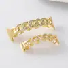 Grillz de Hip Hop Chapados en Oro Cruzados con Incrustaciones de Diamantes Joyería para Dientes Tendencia Callejera Personalidad Grillz Joyería de Broma para Halloween Joyería para Dientes