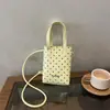 Linda mini bolsa de lunares femenina color caramelo fresco 2026 nueva versátil casual bandolera para teléfono