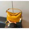 Bolsa de Mão de Design Exclusivo com Fivela de Cadeado, Bolsa de Curling no Gelo, Nova Moda Coreana de Verão 2026, Versátil, de Ombro, Transversal