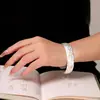 Producto de Plata Auténtico: Pulsera Tradicional de Plata Pura 999.9 con Peonía en Relieve Dorado, Pulsera Ancha Moderna y Sencilla de Nuevo Estilo Chino