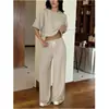Nuevo conjunto de moda casual de dos piezas para mujer, pantalones de pierna ancha de punto a rayas transfronterizos europeos y americanos, manga corta